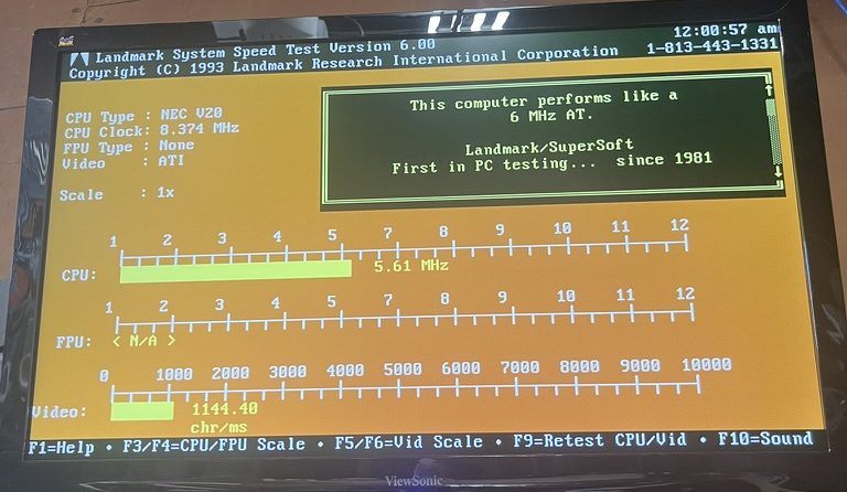 Landmark System Speed Test output showing clock improvements using a higher-clock oscillator. At the upgraded clock speed, the speed test shows a 5.61 MHz measured CPU speed with 1,140 video characters per millisecond.